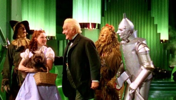 Frank Morgan playing the Wizard of Oz unmasked.